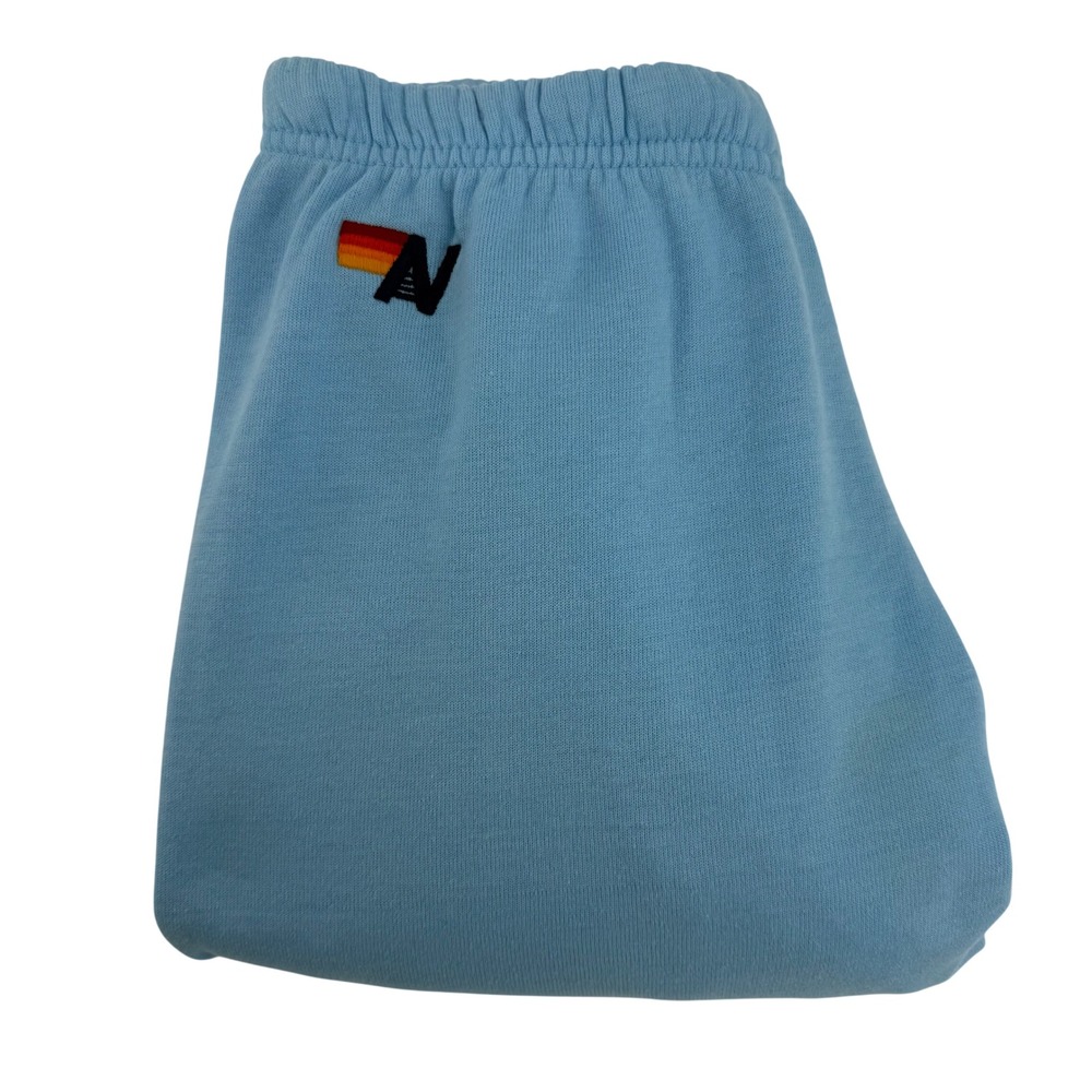 Aviator Nation Light Blue Track Joggers with Retro Stripe Logo
